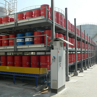 Robotic vertical space utilization for drum storage & filling